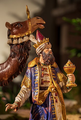 One of the Three Wise Men/Kings/Magi with his camel, detail of the nativity scene in the Saint Peter and Paul church, Weil der Stadt